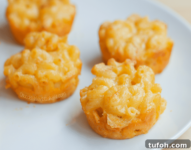 baked mac and cheese cups in a muffin tin