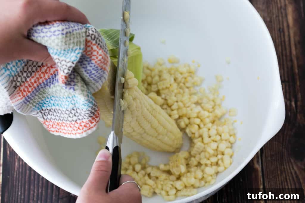 Summer Orzo (Risoni) Salad with Lemon & Fresh Herbs 4 cutting corn kernels off cob with chef's knife