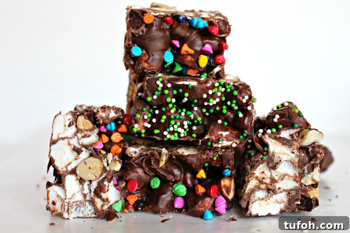 St. Patrick’s Day Chocolate-Covered Oreo Treats 7 Rainbow's End Rocky Road Candy in a stack.