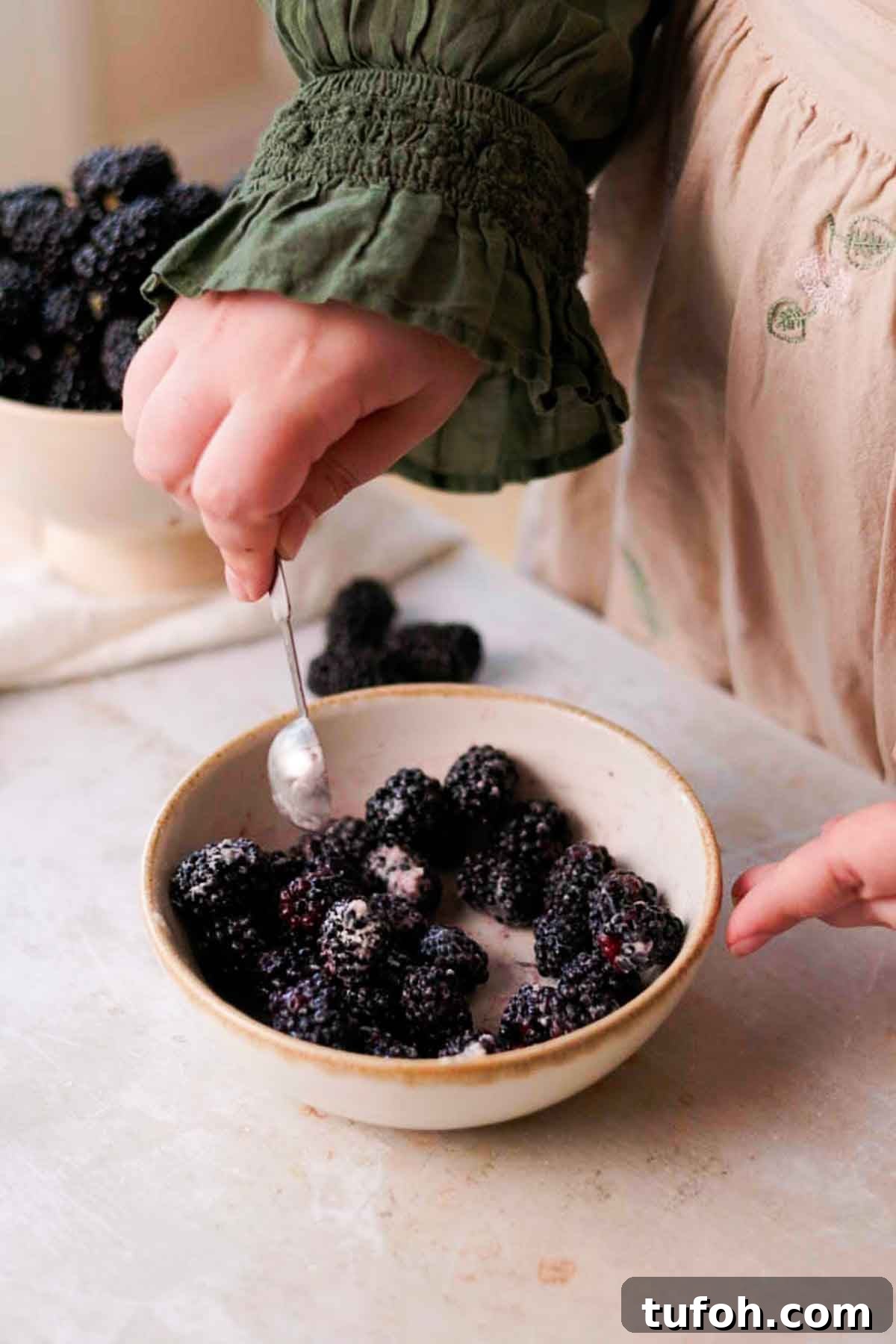 Irresistible Blackberry Muffin Recipe for Perfect Homemade Muffins 7 coating blackberries in flour