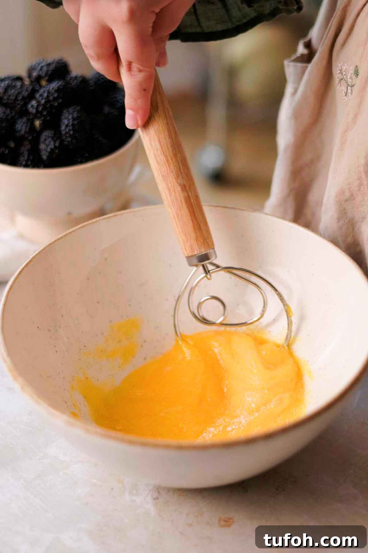 Irresistible Blackberry Muffin Recipe for Perfect Homemade Muffins 8 whisking eggs and sugar together in large bowl
