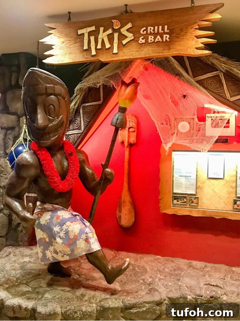 Unforgettable Theme Restaurants to Try in Waikīkī 2 Theming inside Tiki's Grill & Bar in Waikīkī, giving the restaurant a lively, vintage Hawaiʻi vibe.