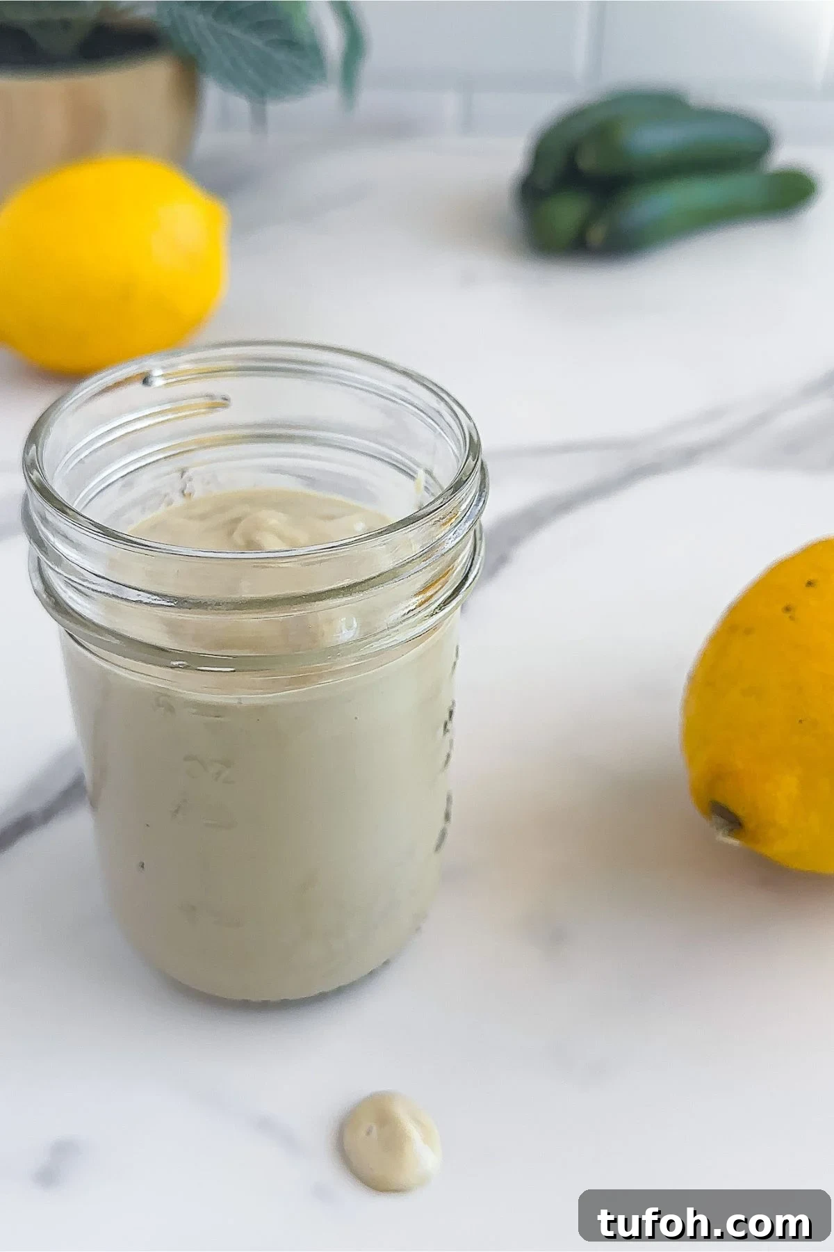 Creamy Tahini Dressing Recipe for Salads and Bowls 8 Jar of tahini dressing.