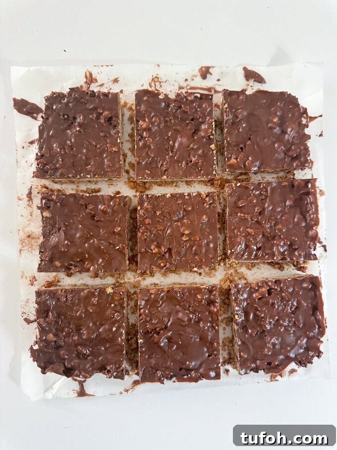 Peanut Butter Chocolate Flapjack Recipe — Chewy Oaty Bars 2 Peanut Butter Chocolate Flapjacks cut into 9 equal squares ready to eat.