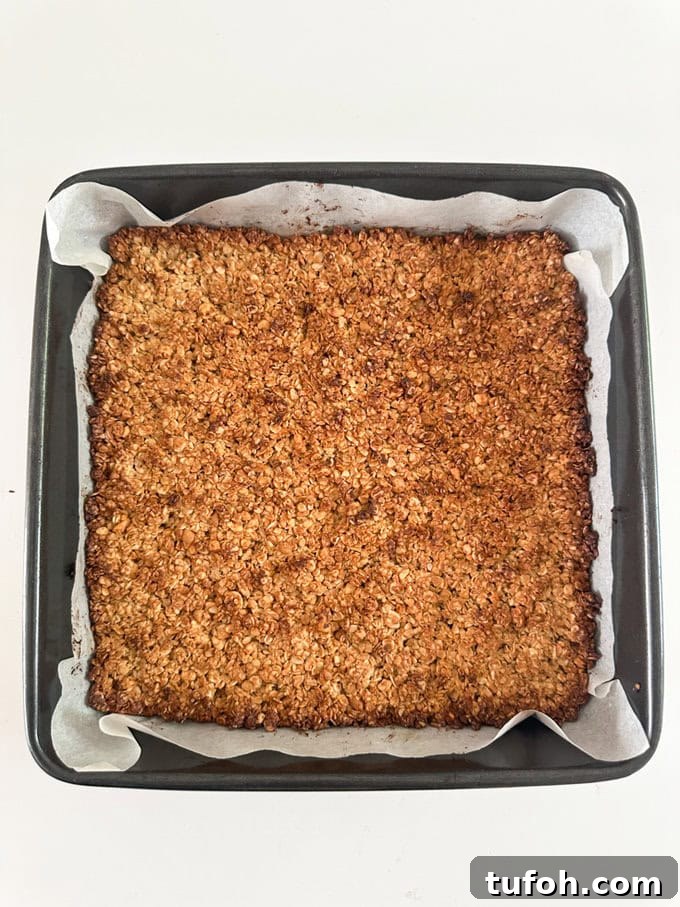 Peanut Butter Chocolate Flapjack Recipe — Chewy Oaty Bars 6 Peanut Butter Chocolate Flapjacks fresh out of the oven and golden brown.
