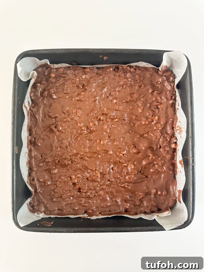 Peanut Butter Chocolate Flapjack Recipe — Chewy Oaty Bars 8 Chocolate added to the cooled Peanut Butter Chocolate Flapjack mix.