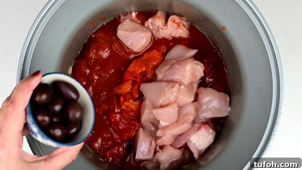 Slow Cooker Greek Chicken with Lemon-Orzo Recipe 5 chicken, tomatoes, peppers and olives in a slow cooker