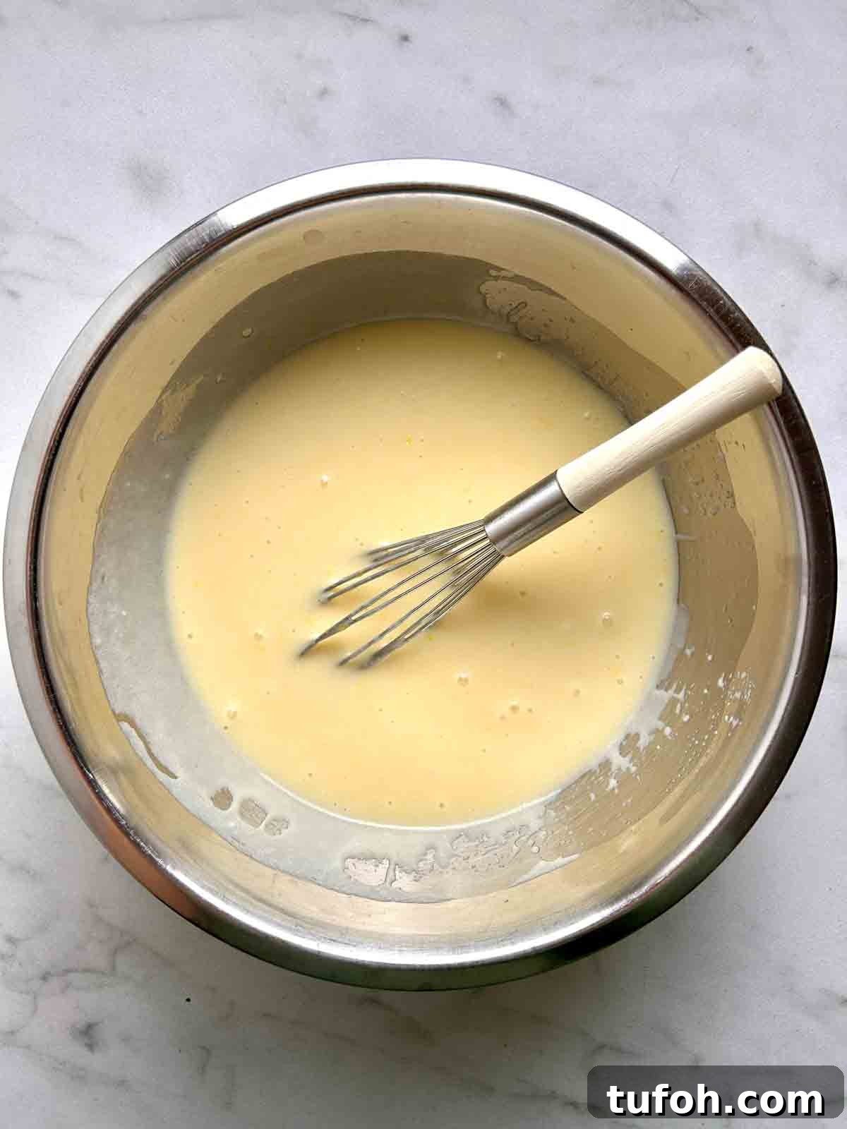 Lemon Poppy Seed Muffins Recipe: Moist, Zesty Muffins in 30 Minutes 5 wet mixture whisked in bowl.