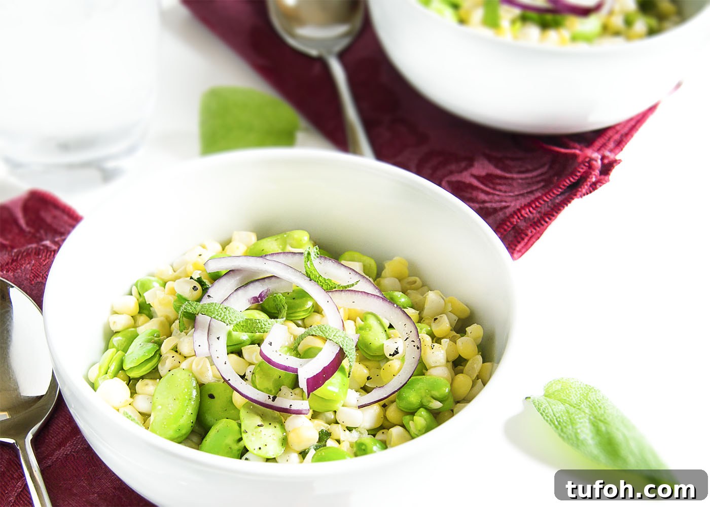 Summer Corn and Fava Bean Salad with Lemon Herb Dressing 4 Fresh Corn and Fava Bean Salad - This fresh and flavorful salad of corn and fava beans is a great way to take that tiny pile of fava beans which you extracted from a giant pile of bean pods and turn it into a satisfying side dish.
