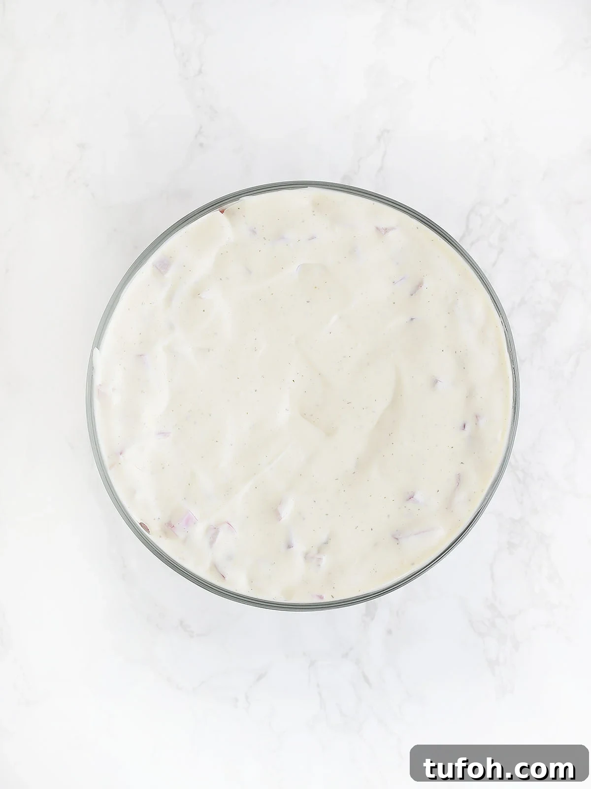 top of cornbread salad topped with ranch dressing