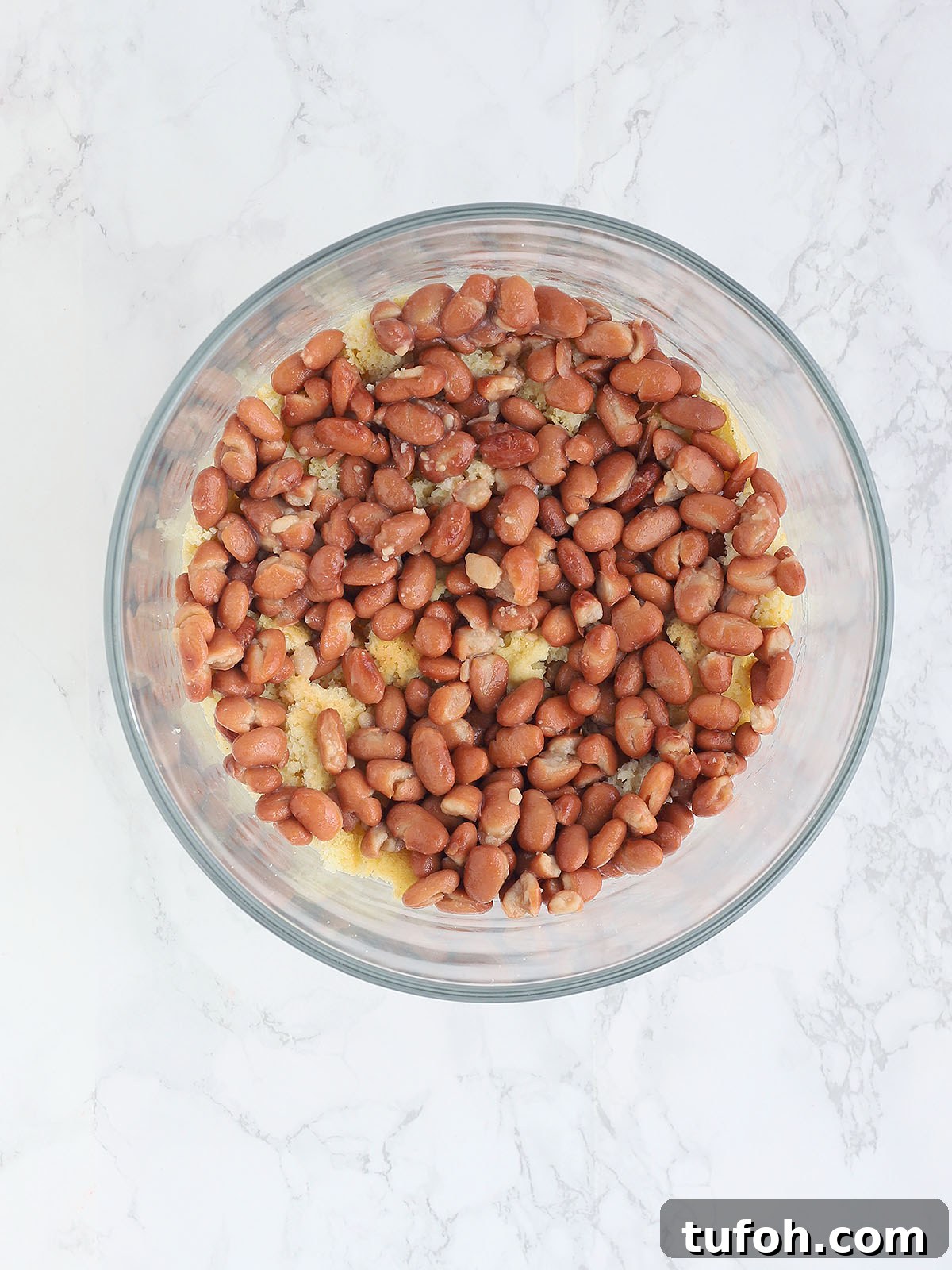 crumbled cornbread topped with pinto beans