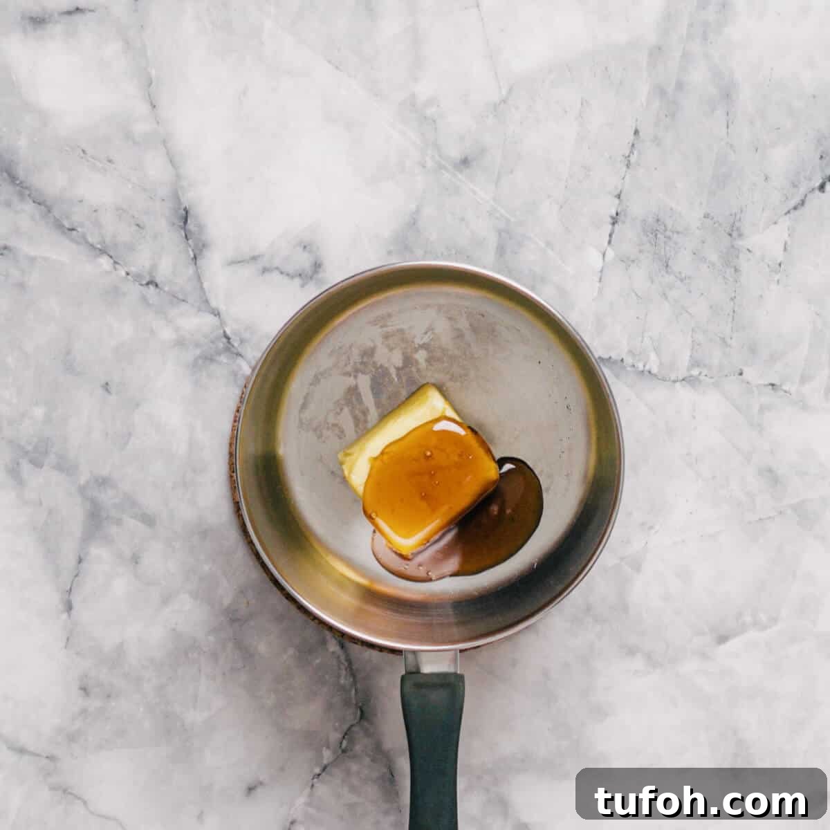 melting butter and golden syrup in a saucepan.