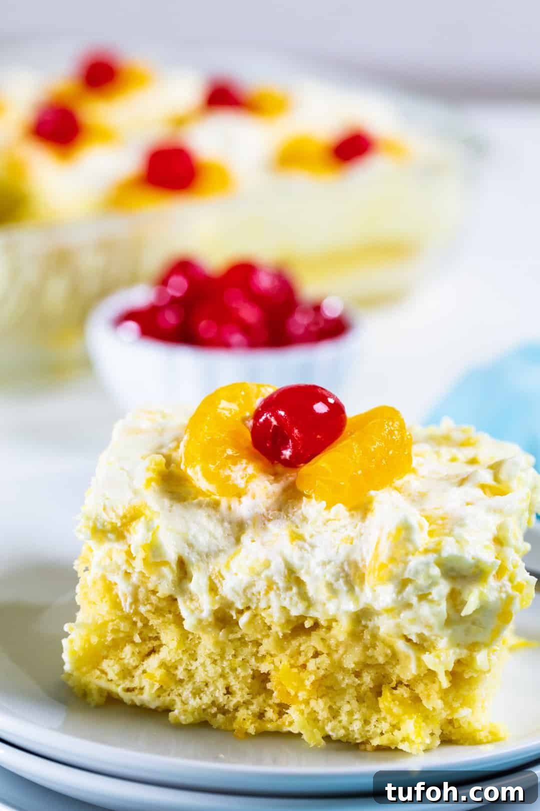 Light Peach Pickin' Cake Recipe — Tender Southern Dessert 4 Piece of Pig Pickin Cake on a plate.