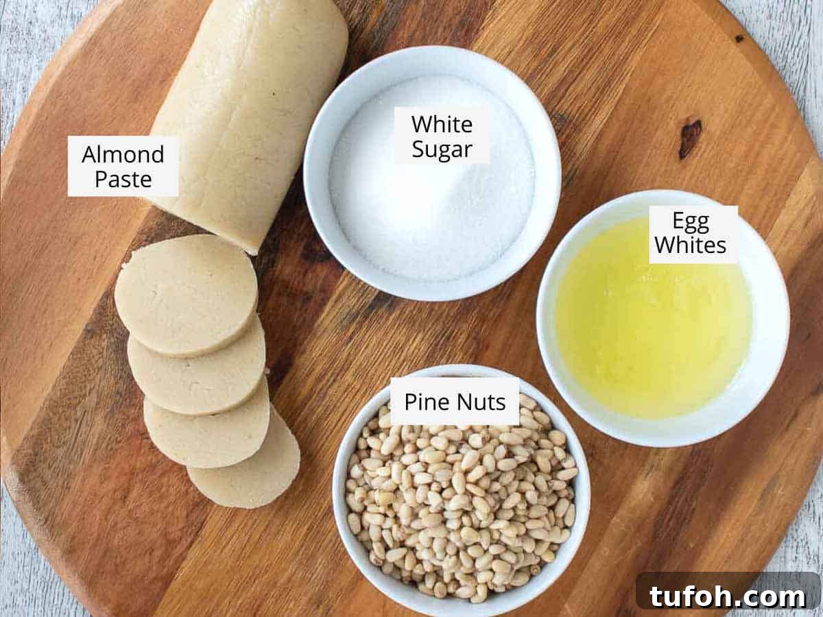 Pignoli Cookies: Classic Italian Almond Macaroon Recipe 3 Ingredients for this recipe viewed from above.