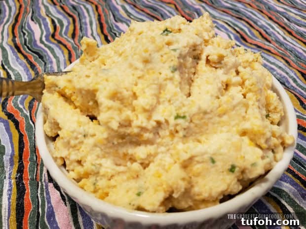 A ramekin full of the cheese spread ready to enjoy on crackers.