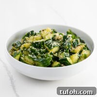 Crisp Smashed Cucumber Salad with Garlic and Sesame Dressing 6 smashed cucumber salad in a bowl