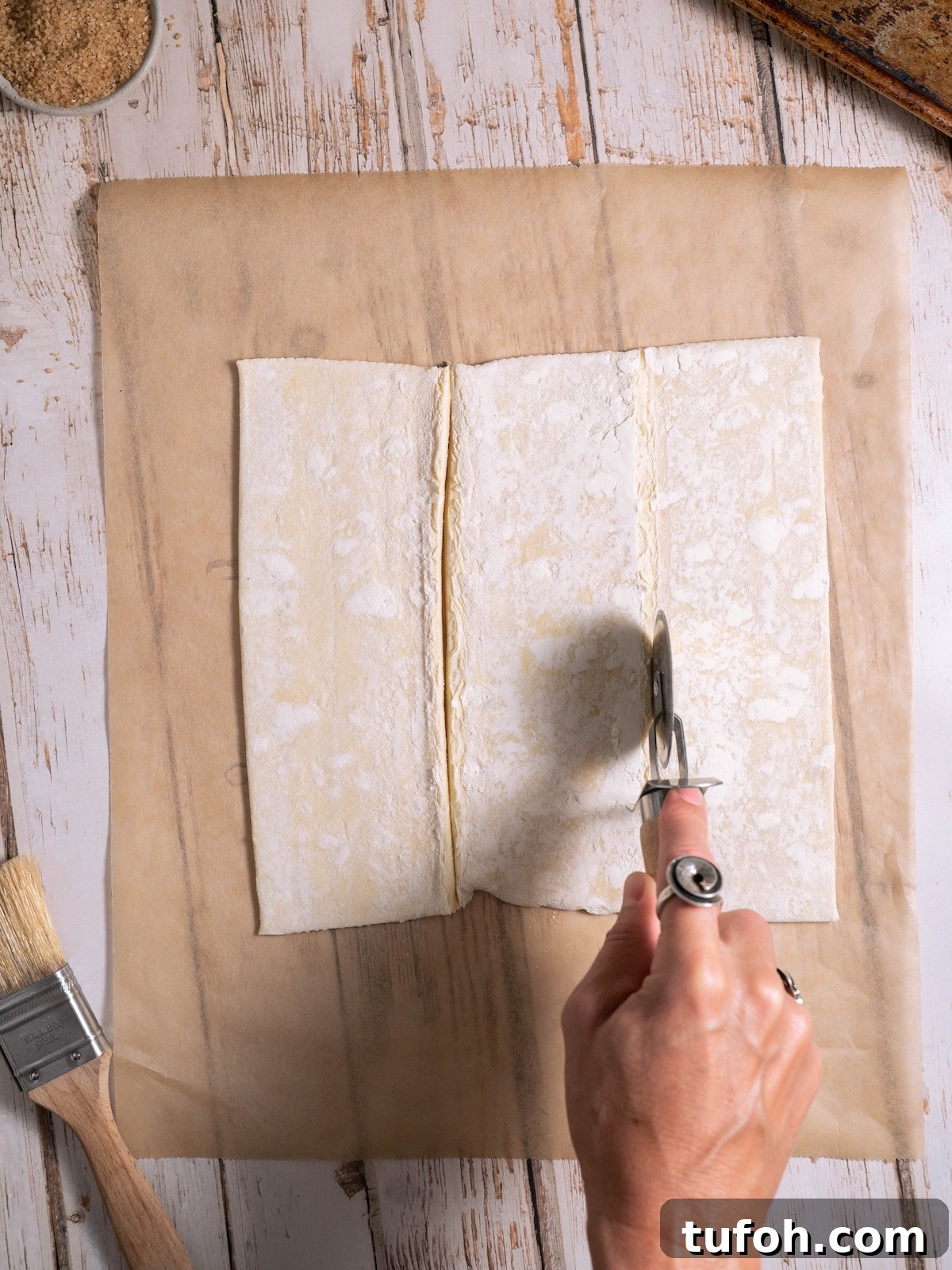 Slicing puff pastry into rectangles