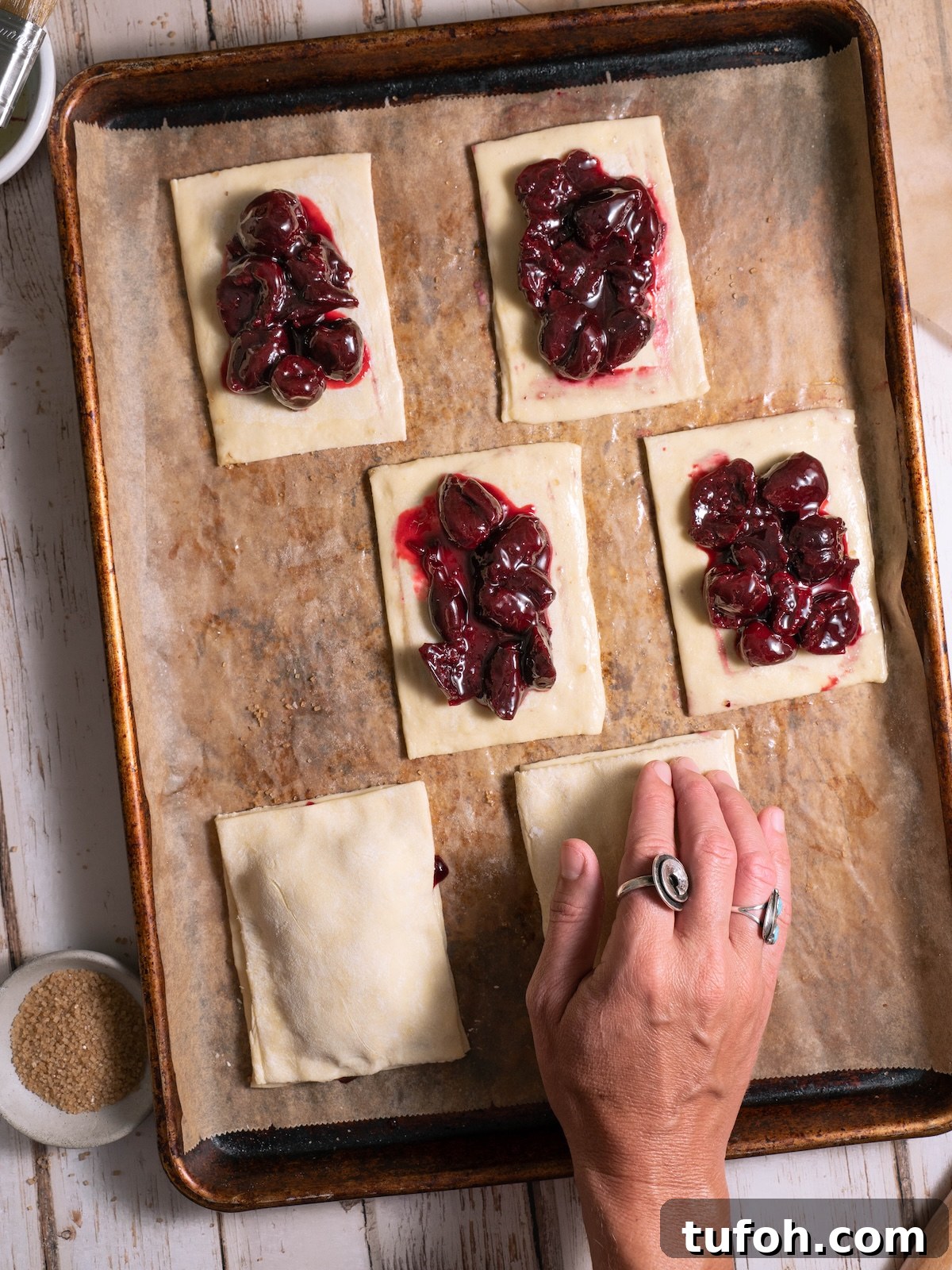 Filling hand pies with cherry filling