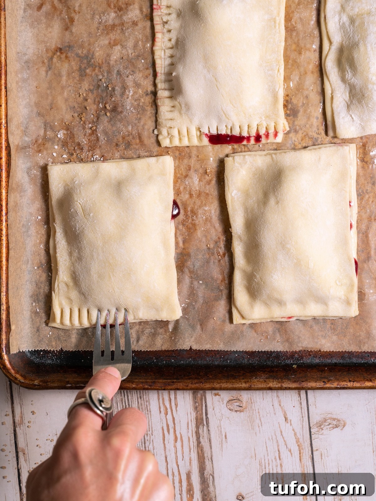 Crimping pies shut with a fork
