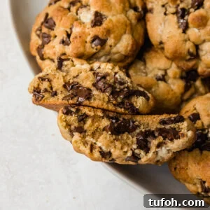 giant chocolate chip cookies made with tahini, brown butter, and halva. a fun twist on the classic inspired by levain bakery.