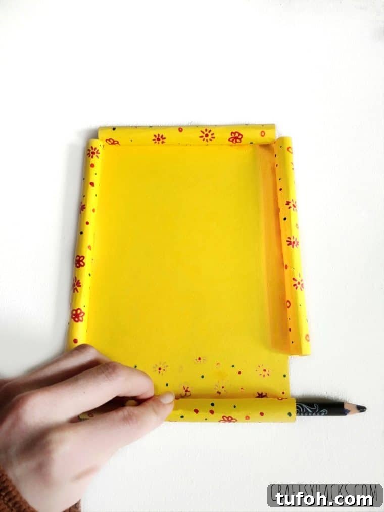 rolled paper with pencil