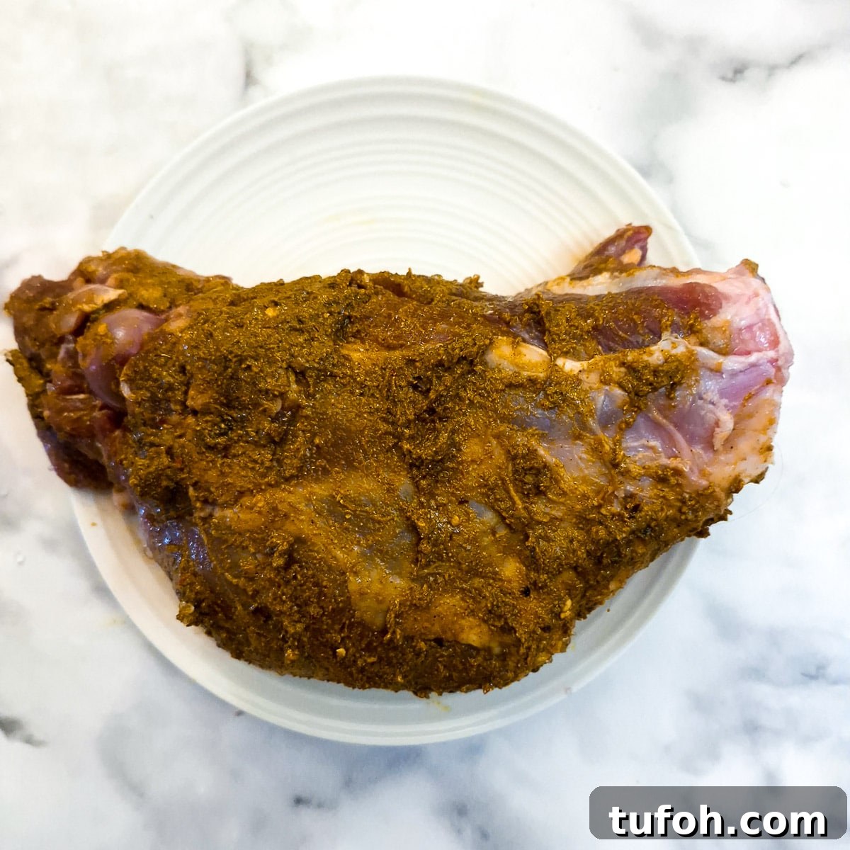 Slow-Cooked Curried Leg of Lamb in Foil for Tender Flavor 6 Leg of lamb rubbed with a curry spice mix.