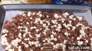 Christmas Chocolate Bark Recipe: Festive Candy & Nut Toppings 7 Melted chocolate