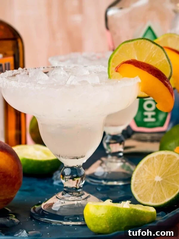peach margarita in a glass