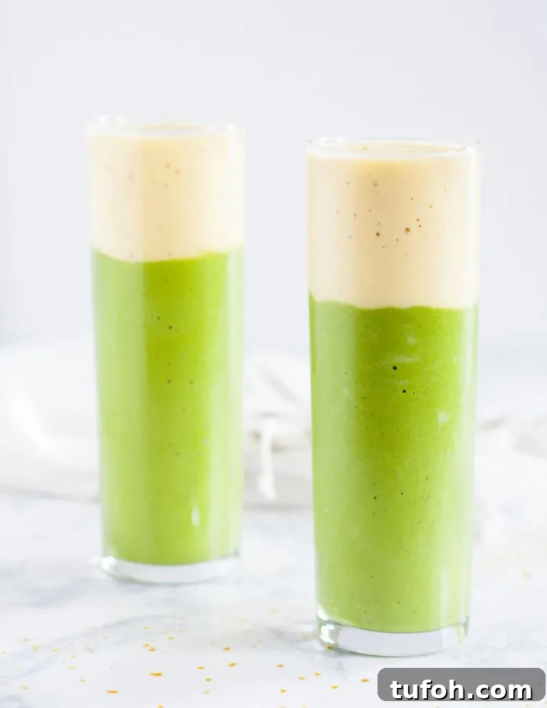 This Tinkerbell inspired smoothie may not give you the ability to fly, but its nutritious ingredients and lovely layering do make days a little more magical! Pineapple spinach layered smoothie recipe on GoodieGodmother.com