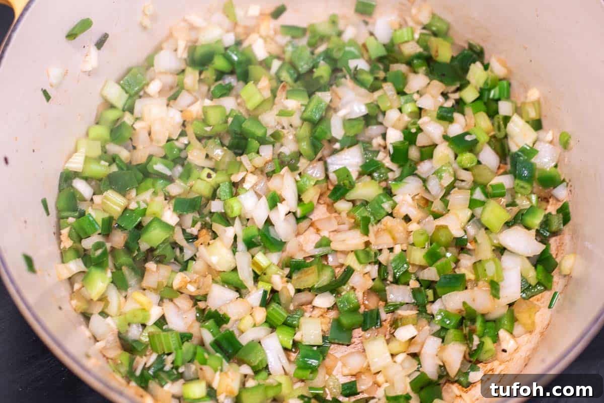 Vegetables cooking in Dutch oven.