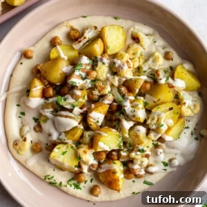 Roasted potato, chickpea, and cauliflower bowls