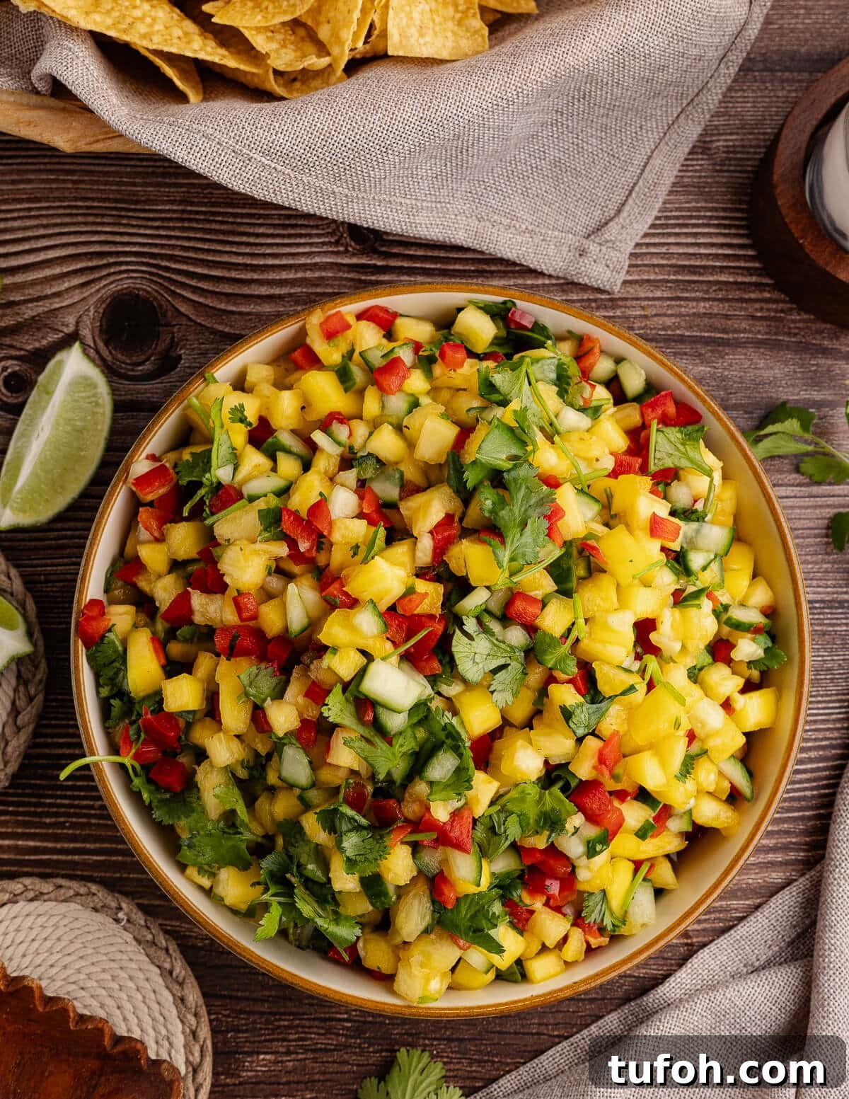 Tangy Pineapple Mango Salsa Recipe for Grilled Fish & Tacos 2 a bowl of pineapple mango salsa