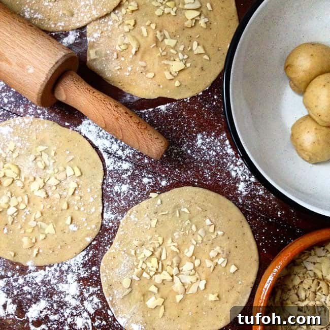 Buñuelos are the traditional Mexican pastry served during the holiday season; these almond buñuelos are sprinkled with citrus sugar and chocolate ganache. Almond Buñuelos