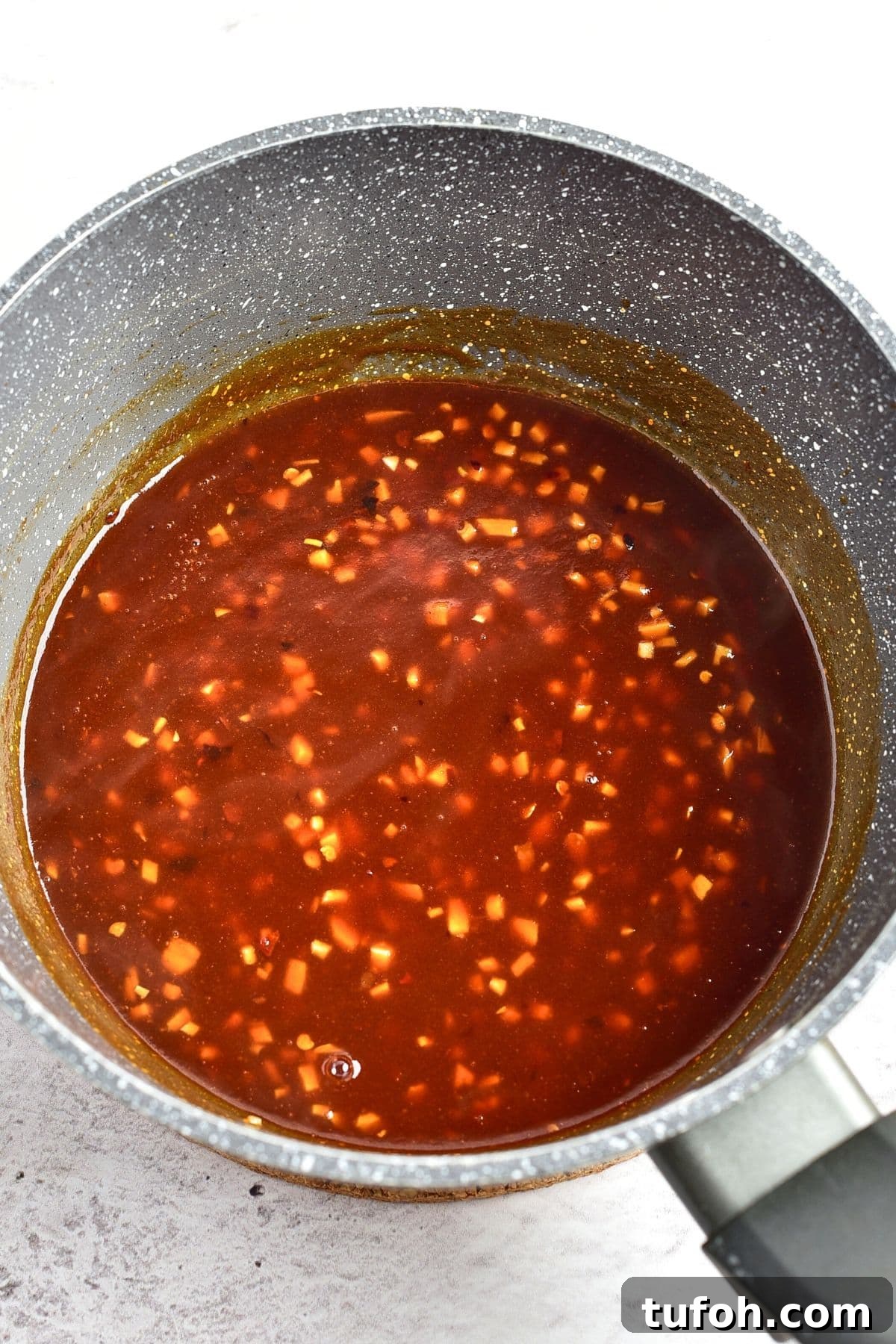 Korean-Style Fried Chicken (Gluten-Free, Dairy-Free) Preparing chili sauce in saucepan