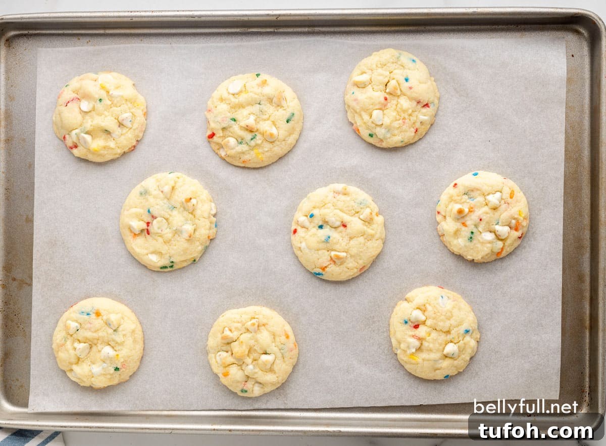 Funfetti Cake Mix Cookies Recipe — Soft, Colorful Cookie Trick 4 overhead cookies on baking sheet