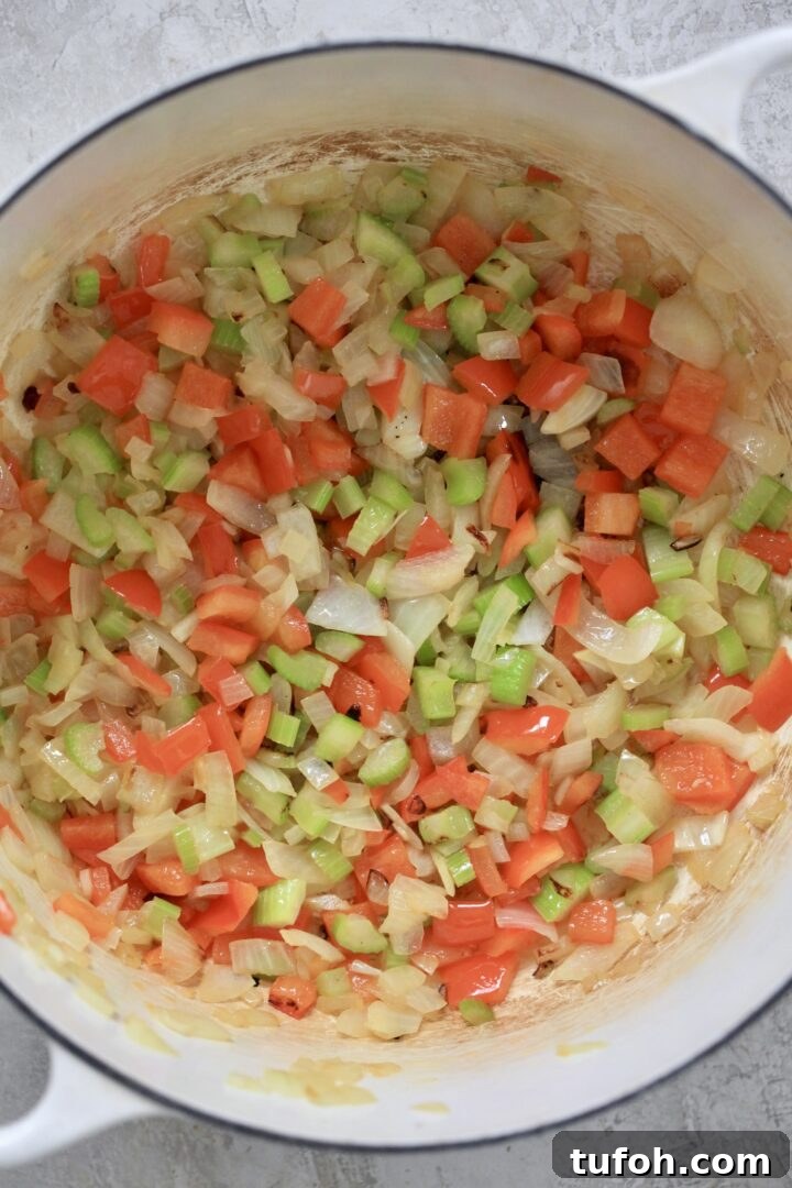 Creamy Dairy-Free Sweet Potato and Black Bean Soup Recipe 4 veggies sautéing in pot