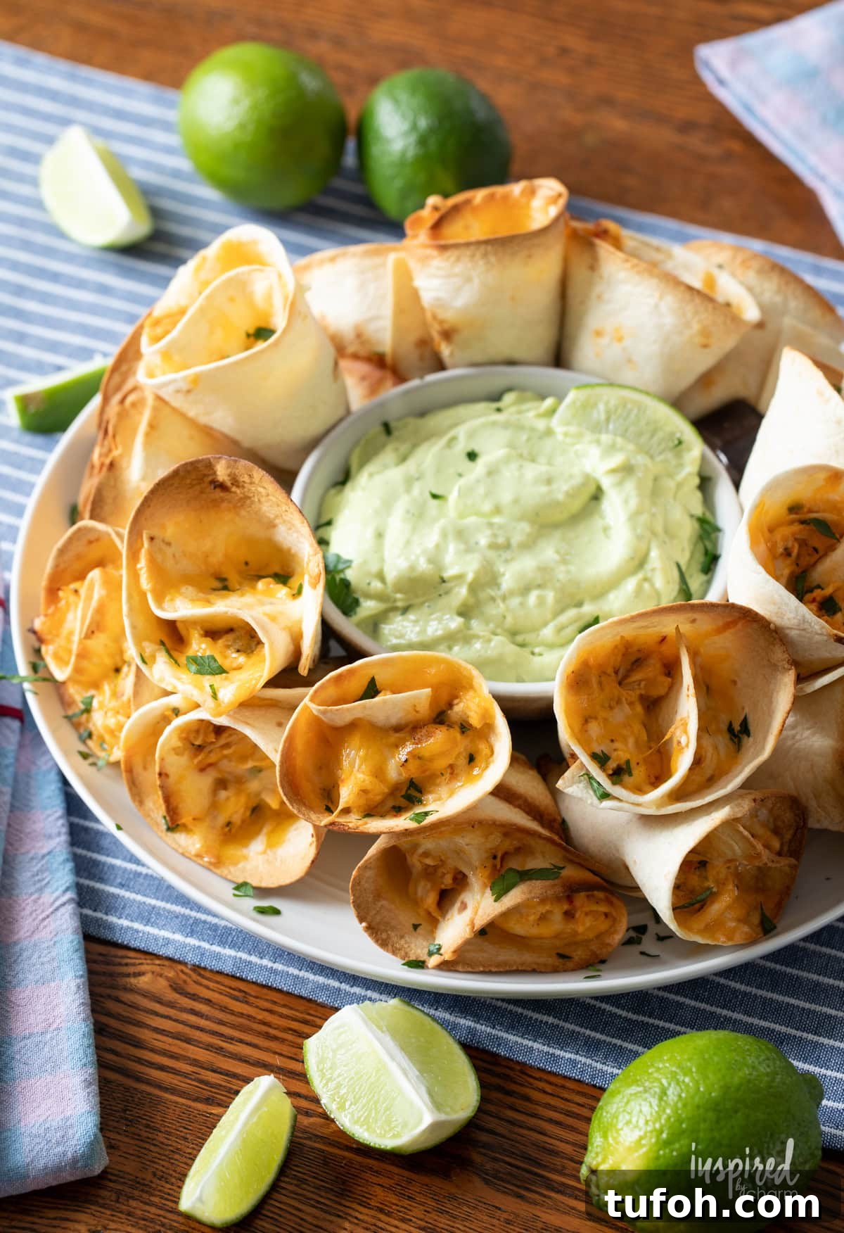 Cheesy Quesadilla Dipper Recipe: Crispy, Gooey Snack Idea 9 big platter of Cheesy Quesadilla Dippers with avocado sauce.