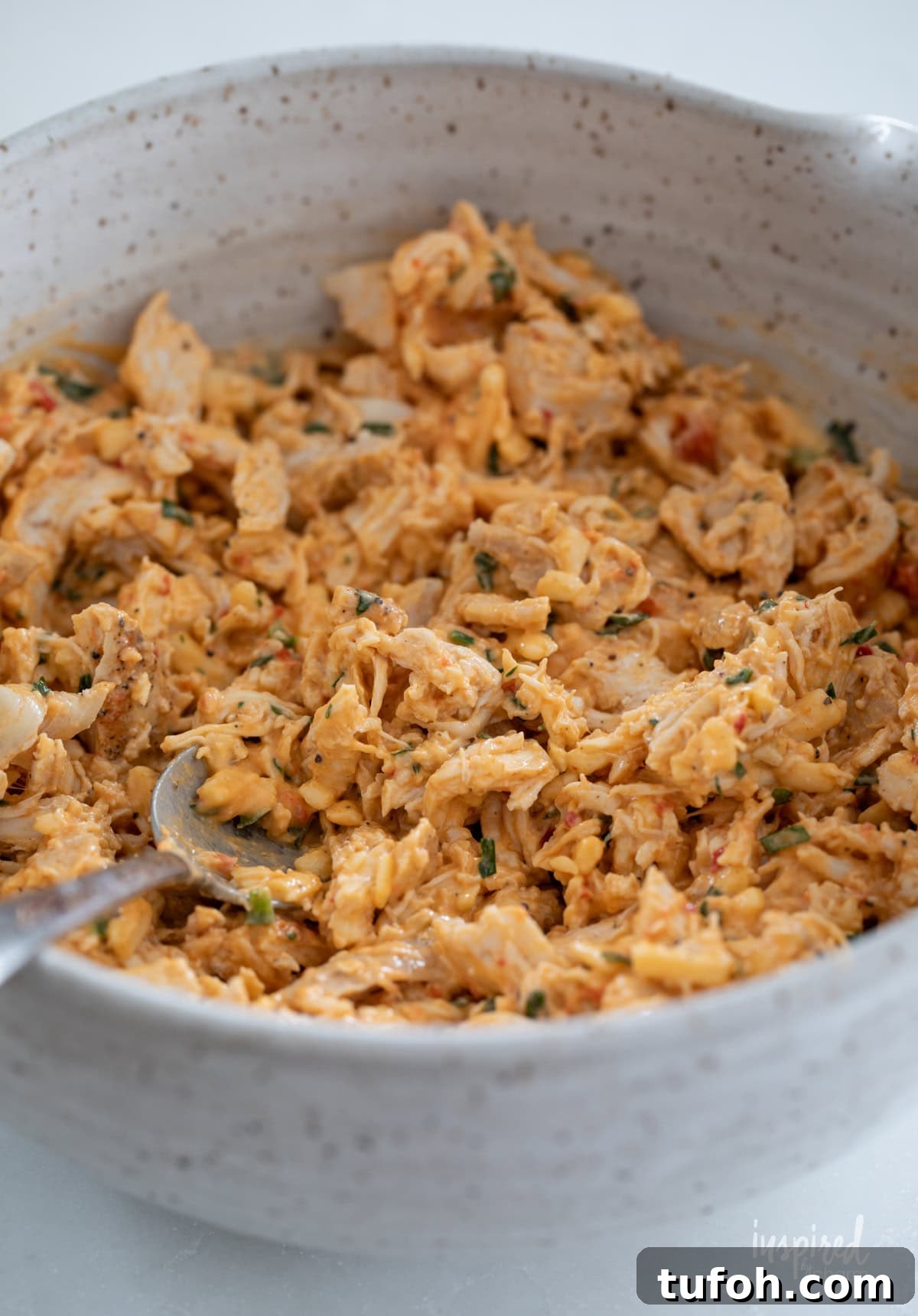 Cheesy Quesadilla Dipper Recipe: Crispy, Gooey Snack Idea 7 pimento cheese and chicken mixed together in a bowl.