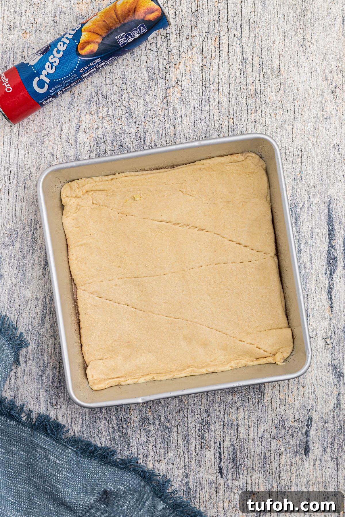 Churro Cheesecake Recipe: Cinnamon-Sugar Cheesecake Bars 5 Crescent roll dough added to the bottom of the pan.