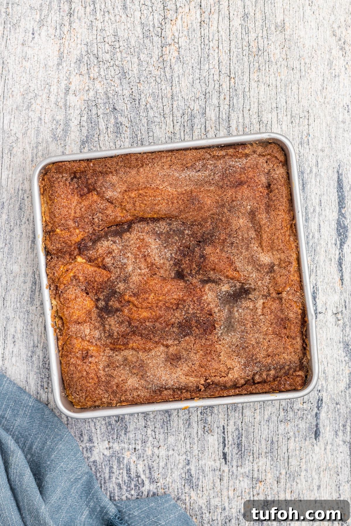 Churro Cheesecake Recipe: Cinnamon-Sugar Cheesecake Bars 10 Baked cheesecake topped with crescent roll, melted butter, cinnamon and sugar.