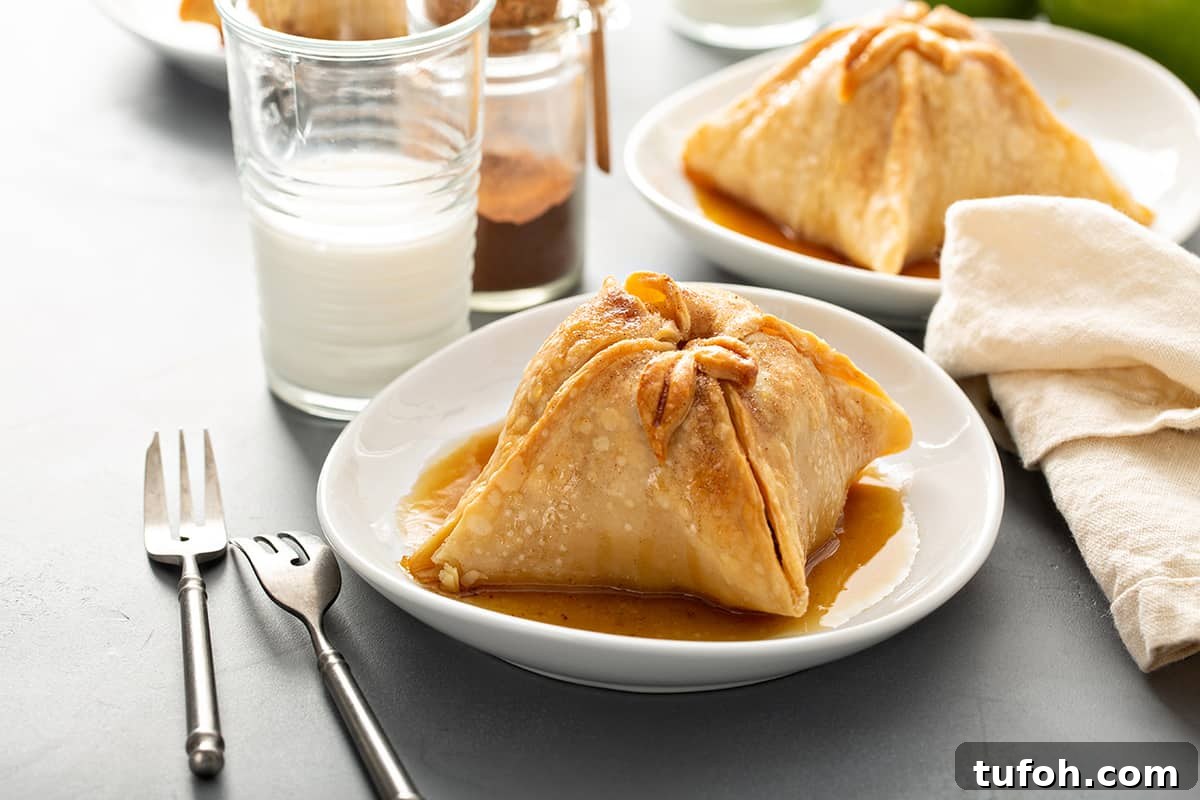 Plated old-fashioned apple dumpling with more apple dumplings in the background