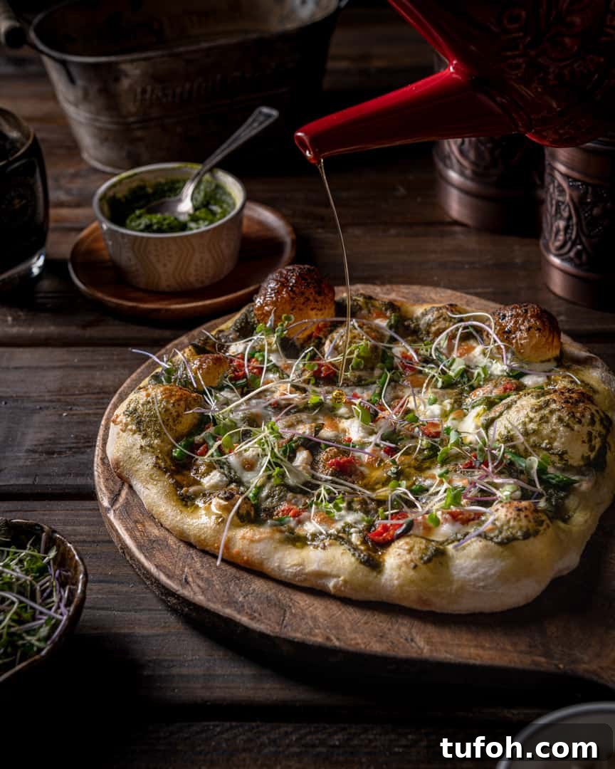 Goat Cheese, Pesto & Asparagus Pizza Recipe for Spring Nights 3 Olive Oil drizzled on pizza