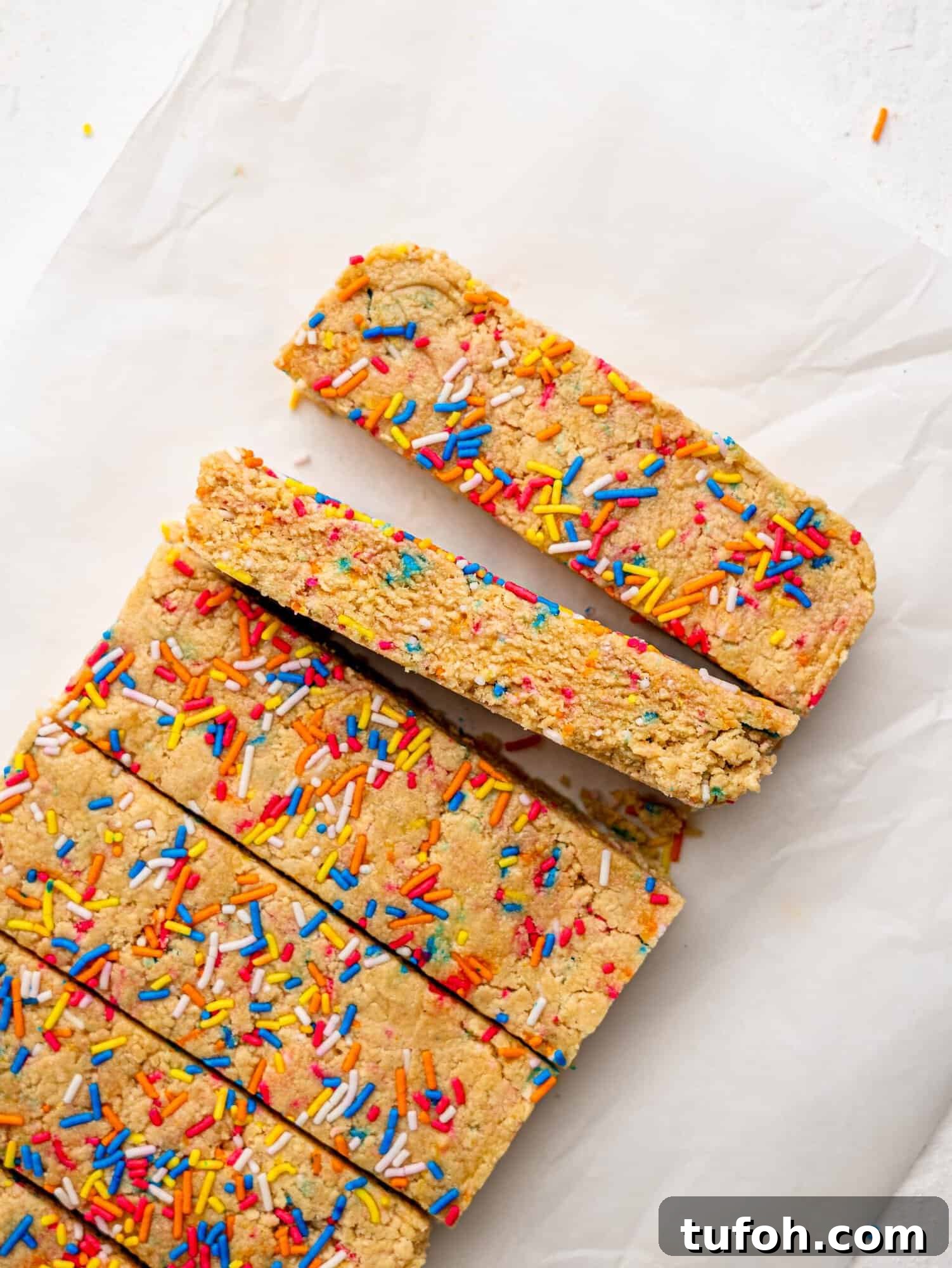 Bird's eye view of birthday cake protein bars.