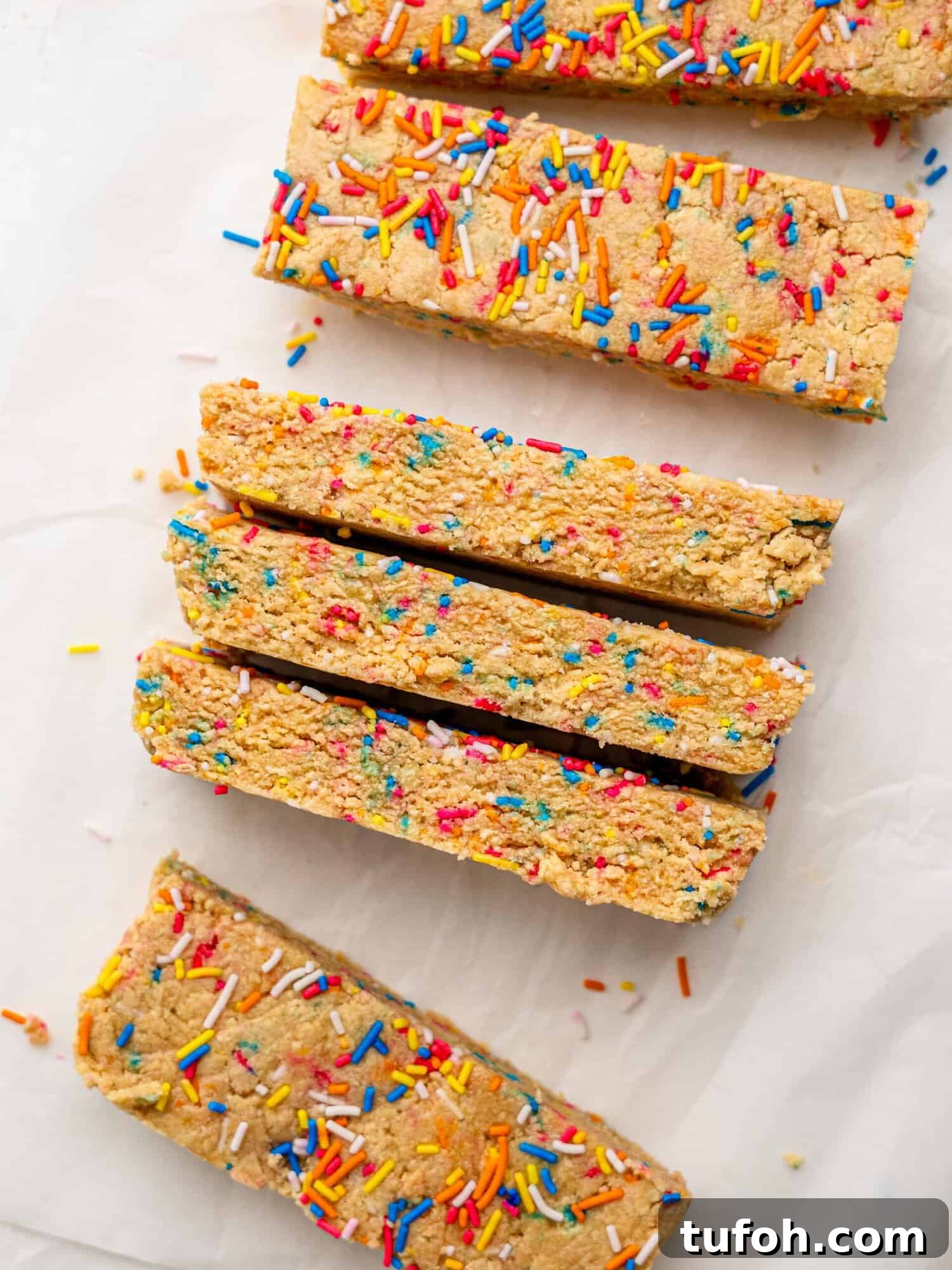 Bird's eye view of birthday cake protein bars.