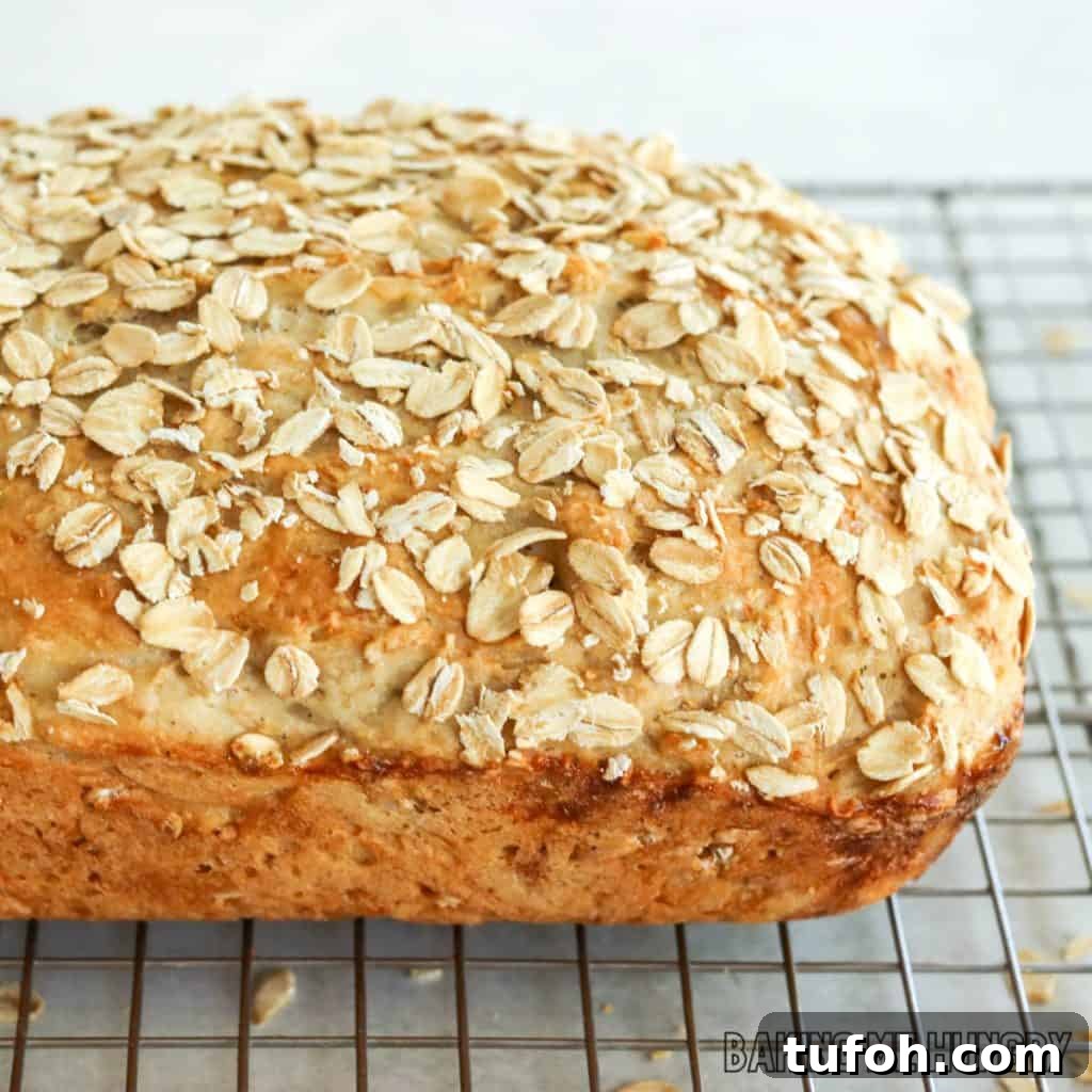 Homemade Oat Bread Recipe: Soft, Nutty Loaf You Can Bake at Home 13 oat bread recipe on wire rack cooling close up