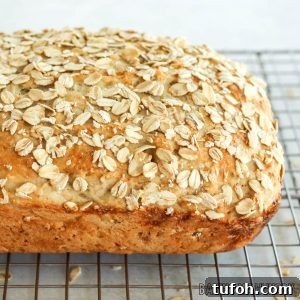 Homemade Oat Bread Recipe: Soft, Nutty Loaf You Can Bake at Home 19 oat bread recipe on wire rack cooling close up