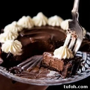 Single-Serve Chocolate French Silk Pie (Gluten-Free, Keto & Paleo) 6 Eating a keto chocolate French silk pie with a fork