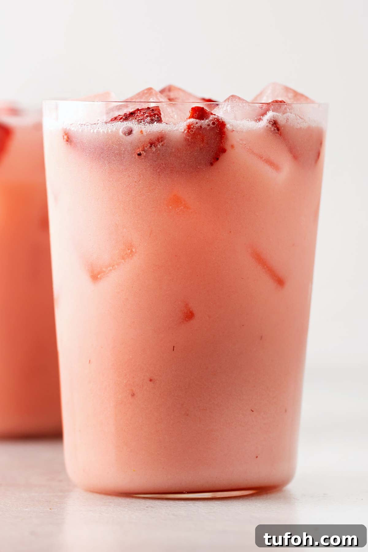 Starbucks Pink Drink in a glass cup.