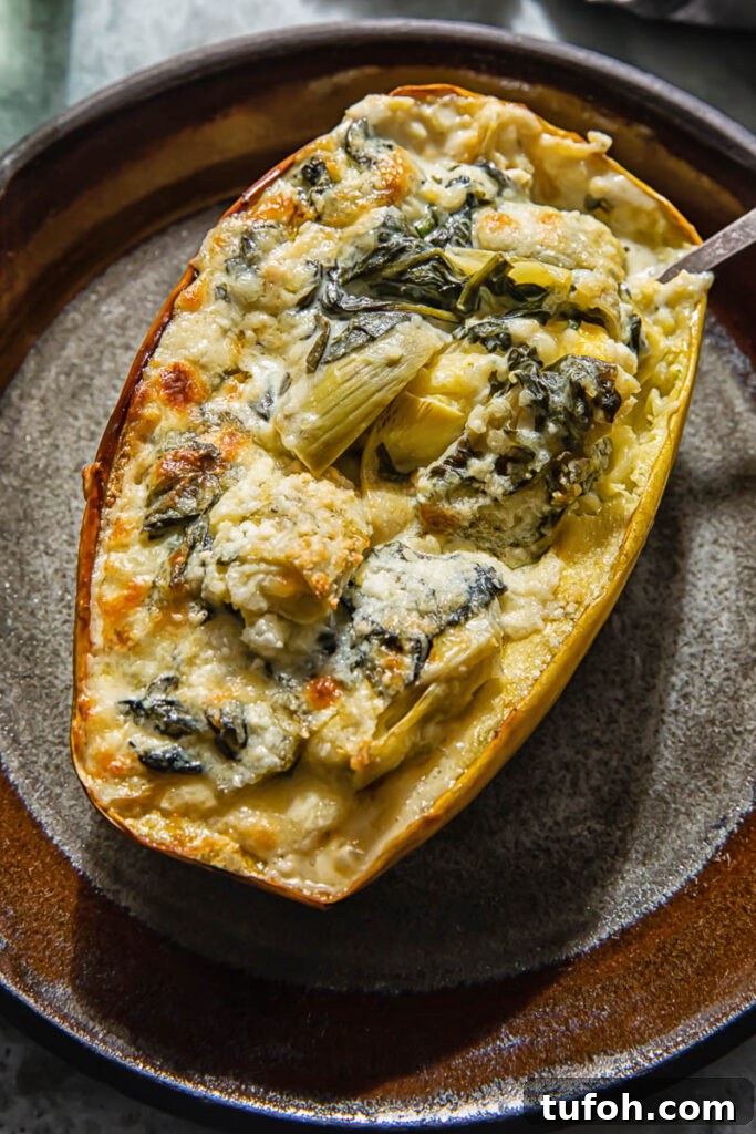 Spaghetti sauce on stuffed with spinach and artichoke on a plate