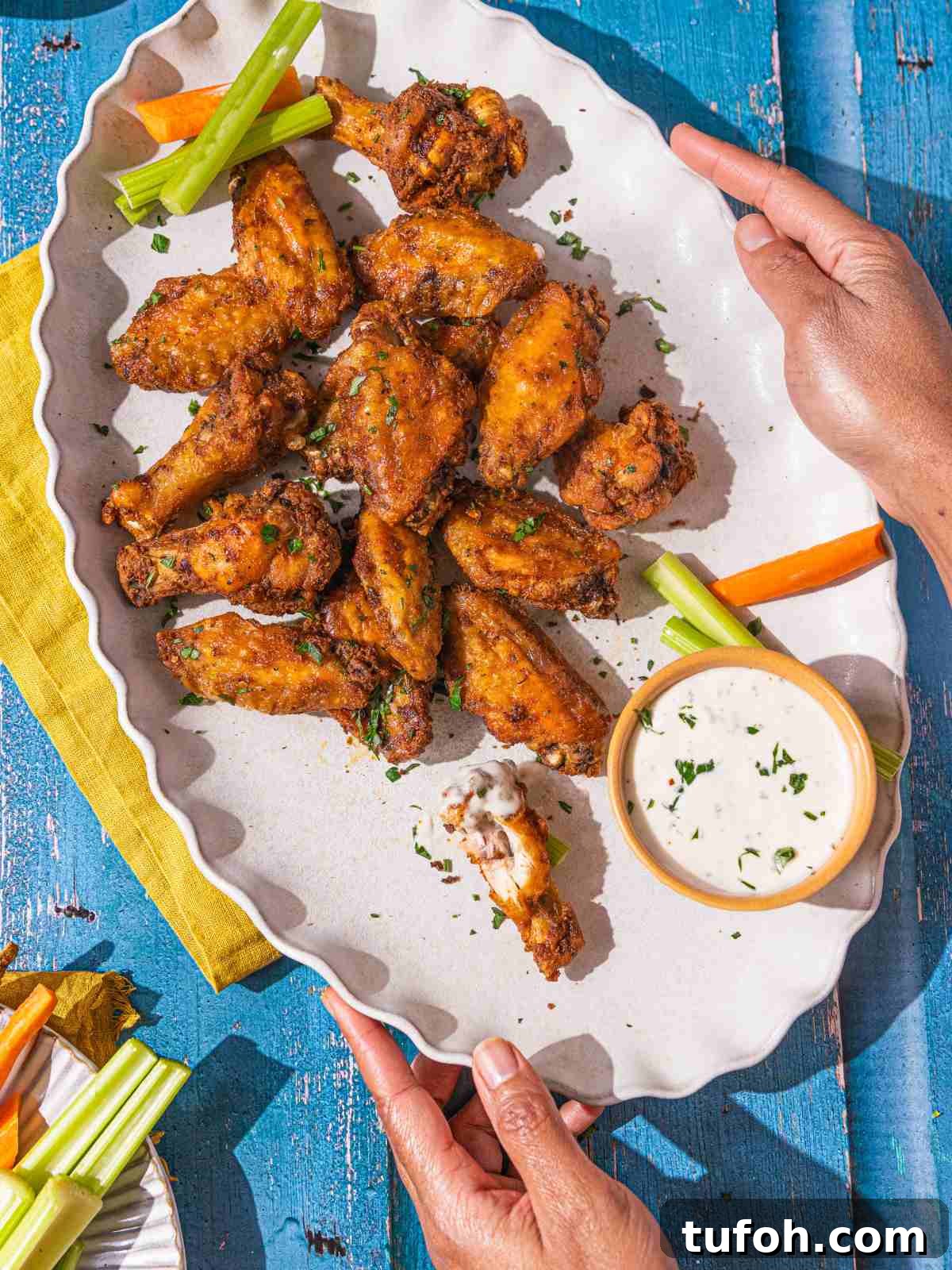 Air Fryer Frozen Chicken Wings (Cook Without Thawing) 8 wings with carrots and carrots.